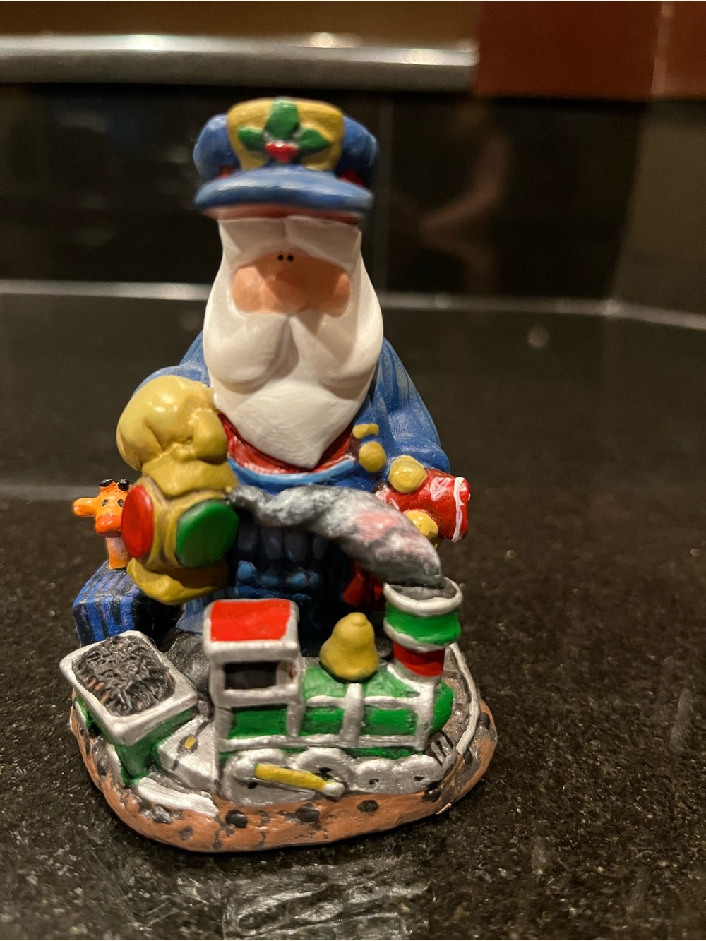 J Adams Collection AD2302 Fe Fi Fo and Fum Santa with Train and Toys.